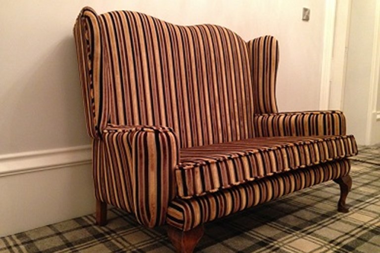 Contemporary fabric on an antique sofa